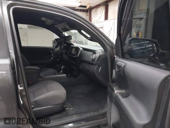 2019 Toyota Tacoma TRD Off Road with VIN 3TMCZ5AN2KM194198, listed as a IAAI auction lot 43463635 with 48,375 mi miles and . Bid and sale history available at DreamBid. Image 5.