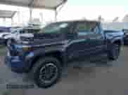 2024 Toyota Tacoma SR5 z VIN 3TMLB5JN5RM080565, wystawiony jako IAAI lot #42584677 z przebiegiem 17 149 mil mil oraz . Historia ofert i sprzedaży dostępna na DreamBid. Obrazek 15.