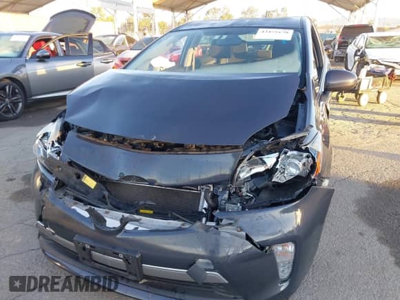 2015 Toyota Prius Advanced z VIN JTDKN3DP5F3068188, wystawiony jako IAAI lot #43475178 z przebiegiem 74 883 mil mil oraz . Historia ofert i sprzedaży dostępna na DreamBid. Obrazek 6.