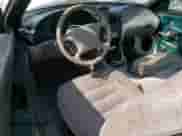 1996 Ford Mustang z VIN 1FALP4041TF206244, wystawiony jako Copart lot #56311934 z przebiegiem 123 572 mil mil oraz Szkoda całkowita • Salvage title. Historia ofert i sprzedaży dostępna na DreamBid. Obrazek 8.