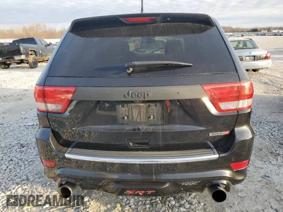 2012 Jeep Grand Cherokee SRT-8 с VIN 1C4RJFDJ2CC265421, выставлен на аукционе Copart как лот 48654325 с пробегом 115 514 миль миль и Списание • Salvage title. История ставок и продаж доступна на DreamBid. Изображение 6.