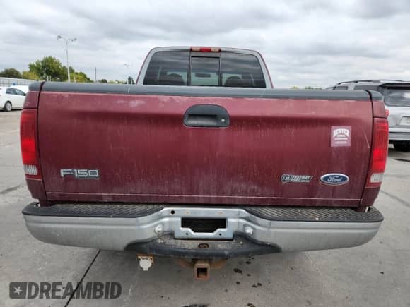 1998 Ford F-150 XL с VIN 1FTEX18L4WKA03275, выставлен на аукционе Copart как лот 84770115 с пробегом 173 880 миль миль и Чистый • Clean title. История ставок и продаж доступна на DreamBid. Изображение 6.