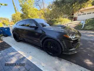 2019 Lamborghini Urus with VIN ZPBUA1ZL8KLA04132, listed as a Copart auction lot 87309295 with 52,699 mi miles and Clean title. Bid and sale history available at DreamBid. Image 1.