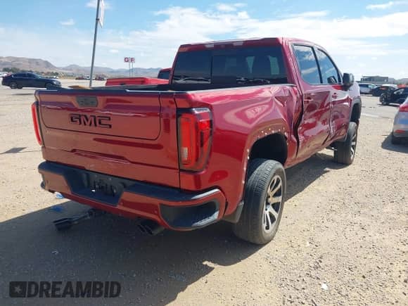 2020 GMC Sierra 1500 AT4 with VIN 3GTP9EED6LG218957, listed as a IAAI auction lot 43151971 with 73,510 mi miles and . Bid and sale history available at DreamBid. Image 4.