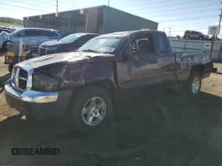 2005 Dodge Dakota SLT with VIN 1D7HE42K55S208497, listed as a Copart auction lot 81769975 with 96,409 mi miles and Salvage title. Bid and sale history available at DreamBid. Image 1.