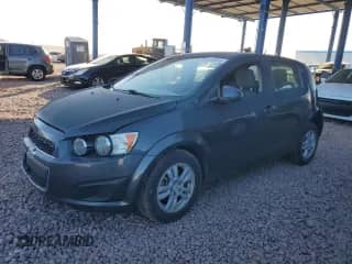 2012 Chevrolet Sonic LS with VIN 1G1JB6SH0C4176718, listed as a Copart auction lot 42645785 with 127,032 mi miles and Salvage title. Bid and sale history available at DreamBid. Image 1.