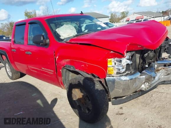 2012 Chevrolet Silverado 1500 LT z VIN 1GCPKSE71CF165597, wystawiony jako IAAI lot #43403597 z przebiegiem 182 867 mil mil oraz . Historia ofert i sprzedaży dostępna na DreamBid. Obrazek 14.