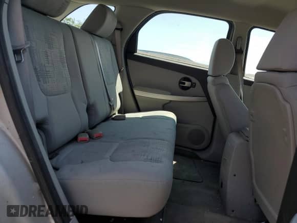 2005 Chevrolet Equinox LS z VIN 2CNDL23F756127035, wystawiony jako Copart lot #65167155 z przebiegiem 34 099 mil mil oraz Czysty tytuł • Clean title. Historia ofert i sprzedaży dostępna na DreamBid. Obrazek 11.