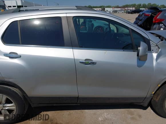 2018 Chevrolet Trax LT z VIN KL7CJLSBXJB596571, wystawiony jako IAAI lot #43137244 z przebiegiem 91 473 mil mil oraz . Historia ofert i sprzedaży dostępna na DreamBid. Obrazek 13.