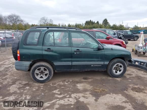 2002 Chevrolet Tracker with VIN 2CNBJ13C126946857, listed as a IAAI auction lot 41491975 with Not provided miles and . Bid and sale history available at DreamBid. Image 14.