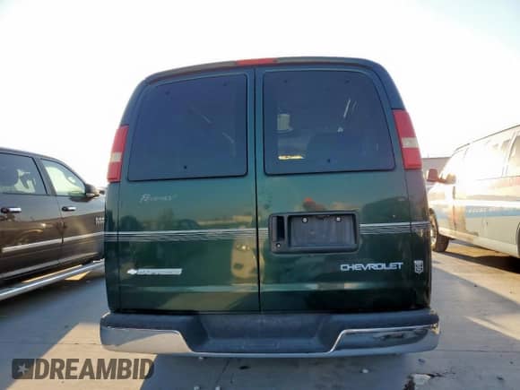 2004 Chevrolet Express Passenger z VIN 1GBFG15T541155274, wystawiony jako Copart lot #82241335 z przebiegiem 103 028 mil mil oraz Szkoda całkowita • Salvage title. Historia ofert i sprzedaży dostępna na DreamBid. Obrazek 6.