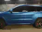 2014 Jeep Grand Cherokee SRT-8 z VIN 1C4RJFDJ0EC497826, wystawiony jako IAAI lot #38543666 z przebiegiem 79 937 mil mil oraz . Historia ofert i sprzedaży dostępna na DreamBid. Obrazek 14.