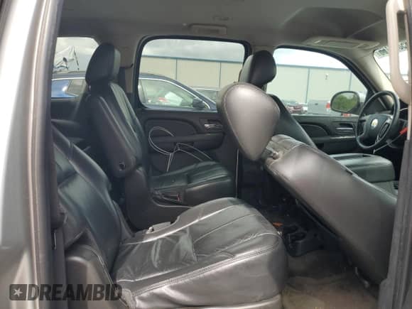2011 Chevrolet Suburban LT with VIN 1GNSCJE0XBR166076, listed as a Copart auction lot 85882165 with 169,114 mi miles and Salvage title. Bid and sale history available at DreamBid. Image 11.