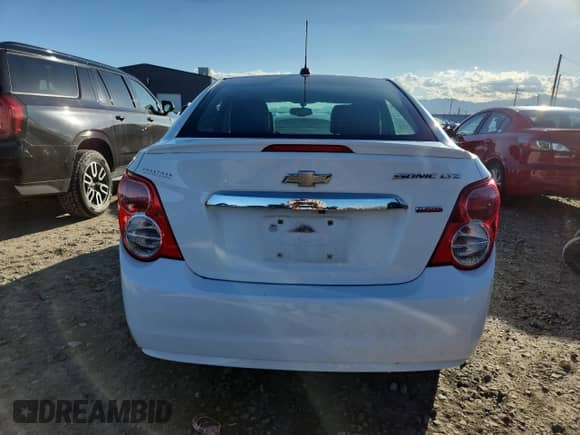 2015 Chevrolet Sonic LTZ с VIN 1G1JE5SB4F4196066, выставлен на аукционе Copart как лот 82400475 с пробегом 141 889 миль миль и Чистый • Clean title. История ставок и продаж доступна на DreamBid. Изображение 6.
