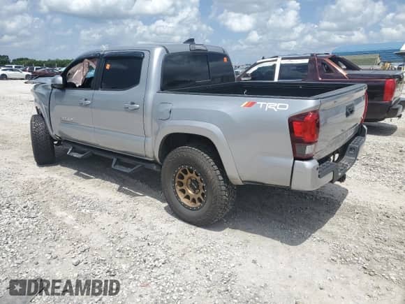 2019 Toyota Tacoma SR с VIN 3TMCZ5AN6KM280565, выставлен на аукционе Copart как лот 67002115 с пробегом 72 839 миль миль и Списание • Salvage title. История ставок и продаж доступна на DreamBid. Изображение 2.