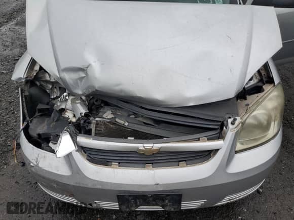 2009 Chevrolet Cobalt LS z VIN 1G1AS58H897211465, wystawiony jako Copart lot #84276775 z przebiegiem 130 510 mil mil oraz Szkoda całkowita • Salvage title. Historia ofert i sprzedaży dostępna na DreamBid. Obrazek 11.