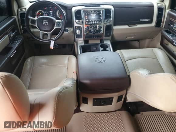 2015 Ram 1500 Laramie z VIN 1C6RR6NT2FS542353, wystawiony jako Copart lot #66445715 z przebiegiem 97 947 mil mil oraz Szkoda całkowita • Salvage title. Historia ofert i sprzedaży dostępna na DreamBid. Obrazek 8.