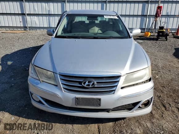 2011 Hyundai Azera GLS z VIN KMHFC4DD9BA532992, wystawiony jako Copart lot #89530105 z przebiegiem 211 041 mil mil oraz Szkoda całkowita • Salvage title. Historia ofert i sprzedaży dostępna na DreamBid. Obrazek 5.