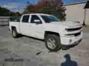 2018 Chevrolet Silverado 1500 LT z VIN 3GCUKREC4JG615182, wystawiony jako Copart lot #81304305 z przebiegiem 192 408 mil mil oraz Szkoda całkowita • Salvage title. Historia ofert i sprzedaży dostępna na DreamBid. Obrazek 4.
