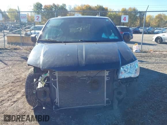 2019 Dodge Grand Caravan SXT with VIN 2C4RDGCG6KR725978, listed as a IAAI auction lot 43458165 with 182,803 mi miles and . Bid and sale history available at DreamBid. Image 12.