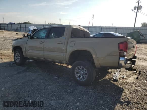 2018 Toyota Tacoma SR with VIN 3TMCZ5AN9JM177204, listed as a Copart auction lot 70188765 with 59,457 mi miles and Salvage title. Bid and sale history available at DreamBid. Image 2.