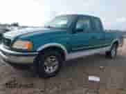 1997 Ford F-150 XL z VIN 1FTEX17L1VNB11979, wystawiony jako IAAI lot #43384566 z przebiegiem 202 543 mil mil oraz . Historia ofert i sprzedaży dostępna na DreamBid. Obrazek 2.