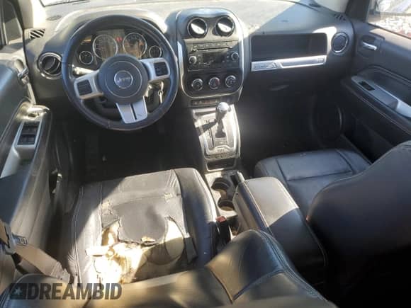 2015 Jeep Compass High Altitude с VIN 1C4NJCEA3FD236245, выставлен на аукционе Copart как лот 42554995 с пробегом 98 950 миль миль и Списание • Salvage title. История ставок и продаж доступна на DreamBid. Изображение 8.