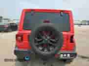 2022 Jeep Wrangler Unlimited Sahara with VIN 1C4JJXP66NW257740, listed as a Copart auction lot 66473935 with 21,823 mi miles and Salvage title. Bid and sale history available at DreamBid. Image 6.