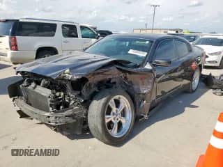 2013 Dodge Charger RT Max с VIN 2C3CDXCT9DH612946, выставлен на аукционе Copart как лот 70389355 с пробегом 93 752 миль миль и Списание • Salvage title. История ставок и продаж доступна на DreamBid. Изображение 1.