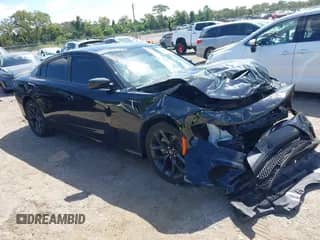 2022 Dodge Charger GT with VIN 2C3CDXHGXNH267715, listed as a IAAI auction lot 43347316 with 24,143 mi miles and . Bid and sale history available at DreamBid. Image 1.