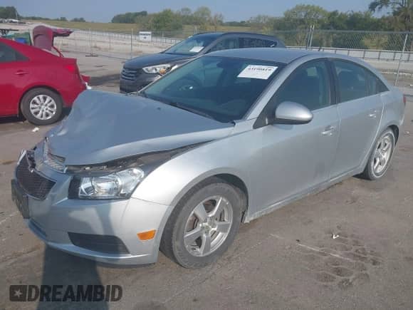 2014 Chevrolet Cruze 1LT with VIN 1G1PC5SB2E7151916, listed as a IAAI auction lot 43190819 with 124,031 mi miles and . Bid and sale history available at DreamBid. Image 17.