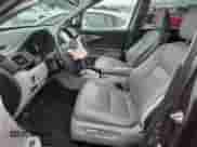 2017 Honda Pilot Elite z VIN 5FNYF6H04HB020693, wystawiony jako Copart lot #81411135 z przebiegiem Nie podano mil oraz Szkoda całkowita • Salvage title. Historia ofert i sprzedaży dostępna na DreamBid. Obrazek 7.