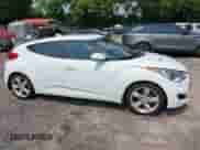 2015 Hyundai Veloster with VIN KMHTC6ADXFU232692, listed as a IAAI auction lot 42407054 with 80,745 mi miles and . Bid and sale history available at DreamBid. Image 13.