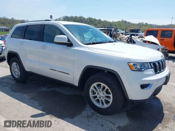 2020 Jeep Grand Cherokee Laredo E z VIN 1C4RJFAG4LC292886, wystawiony jako IAAI lot #42037431 z przebiegiem 79 923 mil mil oraz . Historia ofert i sprzedaży dostępna na DreamBid. Obrazek 1.