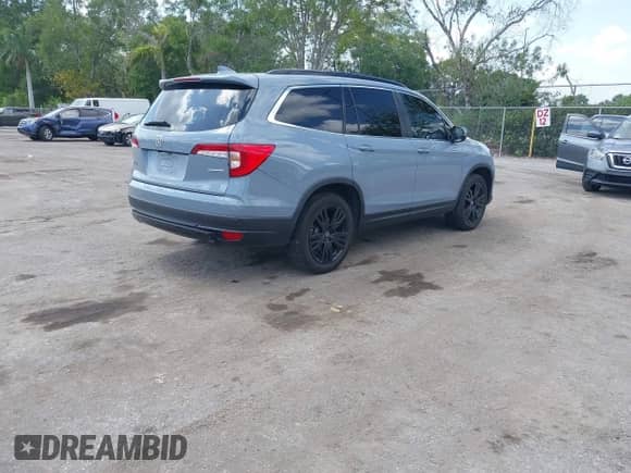 2022 Honda Pilot Special Edition with VIN 5FNYF5H29NB034421, listed as a IAAI auction lot 42108234 with 56,602 mi miles and . Bid and sale history available at DreamBid. Image 4.