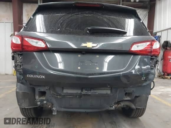 2018 Chevrolet Equinox LT with VIN 3GNAXJEV6JL166030, listed as a IAAI auction lot 43416293 with 102,228 mi miles and . Bid and sale history available at DreamBid. Image 6.