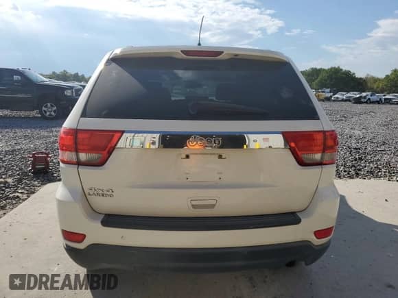 2011 Jeep Grand Cherokee Laredo с VIN 1J4RR4GG3BC546326, выставлен на аукционе Copart как лот 84803395 с пробегом 257 190 миль миль и Списание • Salvage title. История ставок и продаж доступна на DreamBid. Изображение 6.