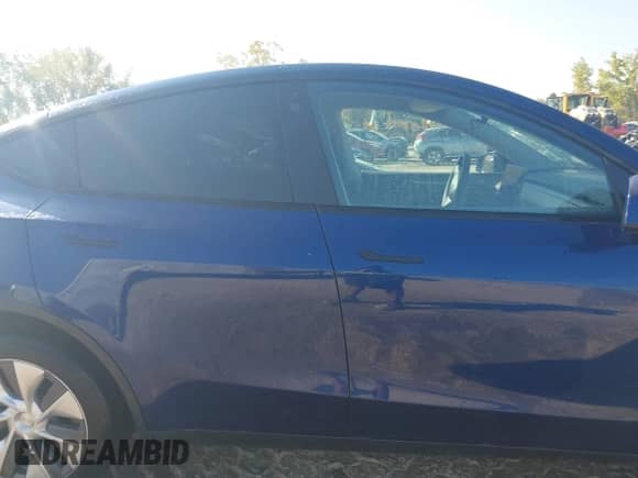 2023 Tesla Model Y Long Range with VIN 7SAYGDEE4PA125024, listed as a IAAI auction lot 43252218 with 21,200 mi miles and . Bid and sale history available at DreamBid. Image 14.