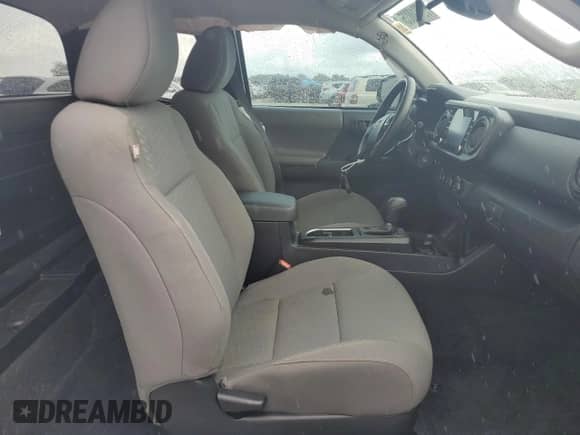 2023 Toyota Tacoma SR z VIN 3TYRX5GN2PT085100, wystawiony jako Copart lot #70010035 z przebiegiem 48 446 mil mil oraz Szkoda całkowita • Salvage title. Historia ofert i sprzedaży dostępna na DreamBid. Obrazek 7.