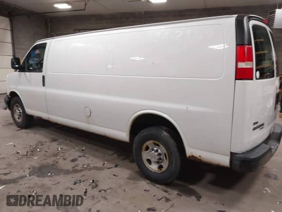 2012 Chevrolet Express Cargo with VIN 1GCWGGBA0C1100411, listed as a IAAI auction lot 41024219 with 197,251 mi miles and . Bid and sale history available at DreamBid. Image 3.