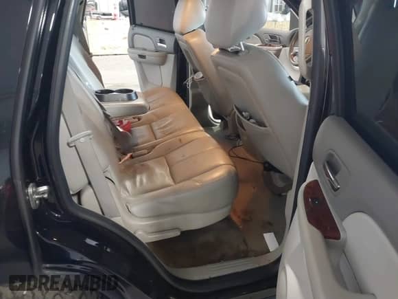2014 Chevrolet Tahoe LT with VIN 1GNSCBE07ER249202, listed as a IAAI auction lot 42546283 with 124,538 mi miles and . Bid and sale history available at DreamBid. Image 8.
