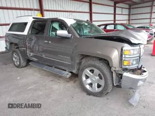 2014 Chevrolet Silverado 1500 LTZ with VIN 3GCUKSEC9EG361983, listed as a IAAI auction lot 43318172 with 215,339 mi miles and . Bid and sale history available at DreamBid. Image 1.