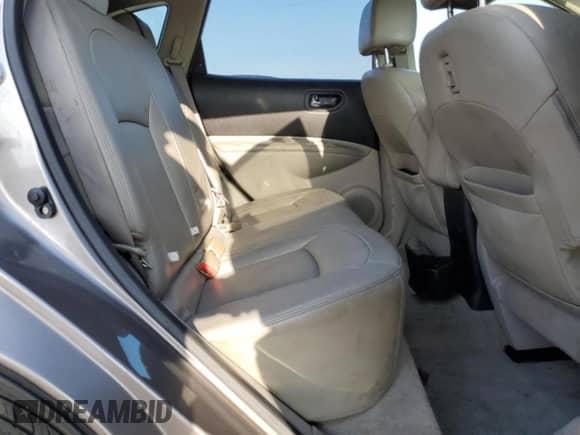 2010 Nissan Rogue SL with VIN JN8AS5MT0AW013009, listed as a Copart auction lot 69099655 with 106,273 mi miles and Salvage title. Bid and sale history available at DreamBid. Image 10.
