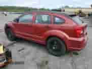2007 Dodge Caliber SXT with VIN 1B3HB48B27D150528, listed as a Copart auction lot 80480025 with 121,779 mi miles and Salvage title. Bid and sale history available at DreamBid. Image 2.