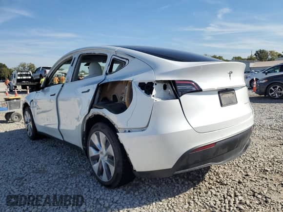 2022 Tesla Model Y Long Range с VIN 7SAYGDEE4NF339544, выставлен на аукционе Copart как лот 84565635 с пробегом 54 231 миль миль и Списание • Salvage title. История ставок и продаж доступна на DreamBid. Изображение 2.