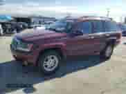 2002 Jeep Grand Cherokee Laredo with VIN 1J4GX48SX2C310790, listed as a Copart auction lot 85556515 with 165,485 mi miles and Salvage title. Bid and sale history available at DreamBid. Image 1.