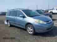 2006 Toyota Sienna XLE z VIN 5TDBA22C06S072184, wystawiony jako IAAI lot #42522017 z przebiegiem 206 964 mil mil oraz . Historia ofert i sprzedaży dostępna na DreamBid. Obrazek 1.