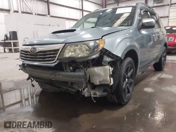2009 Subaru Forester XT Limited with VIN JF2SH66609H763068, listed as a IAAI auction lot 42221733 with 210,159 mi miles and . Bid and sale history available at DreamBid. Image 17.