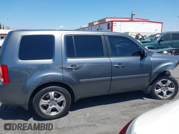 2013 Honda Pilot EX-L with VIN 5FNYF4H57DB020214, listed as a IAAI auction lot 43086404 with 96,173 mi miles and . Bid and sale history available at DreamBid. Image 13.