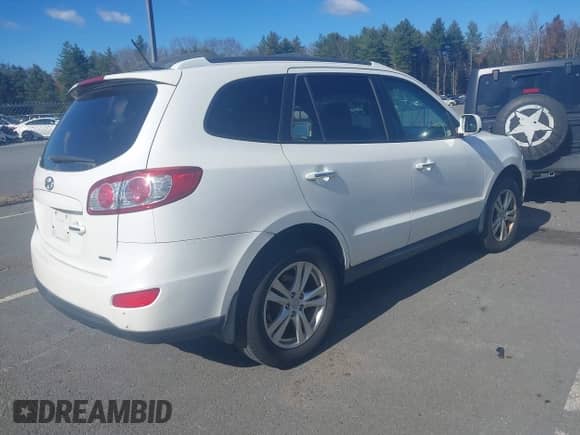 2012 Hyundai Santa Fe Limited with VIN 5XYZK3AB8CG100154, listed as a IAAI auction lot 43558864 with 207,003 mi miles and . Bid and sale history available at DreamBid. Image 4.